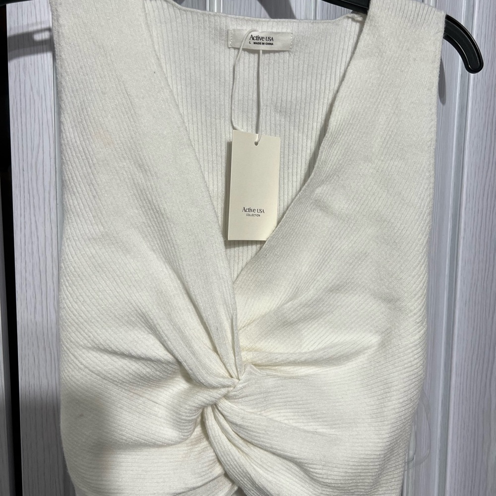 Brand new with tags adorable tank crop top in white.